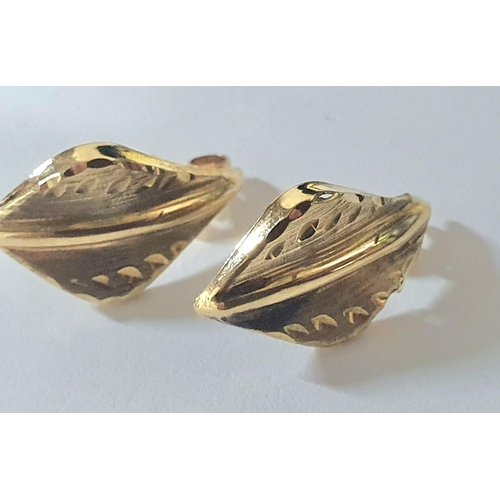 91 - 9ct gold dress ring with a pair of 9ct yellow gold earrings in the form of leaves,

2.3 grams gross