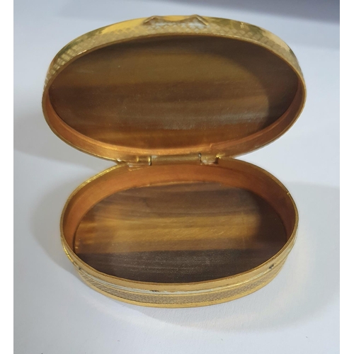 38 - Tigers eye and gilt metal pill box