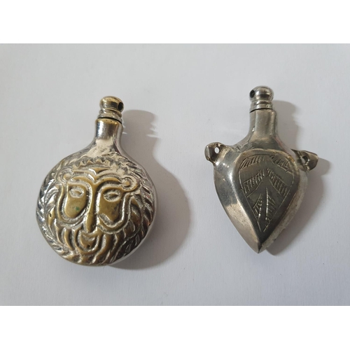 40 - Two foreign, unmarked, heavy, white metal perfume bottles with screw top lids (2)

Approx 64 grams