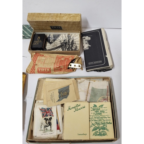 106 - Collectables including cigarette cards, pen knifes, a Mechano Trix set and a Sovereign weighing scal... 