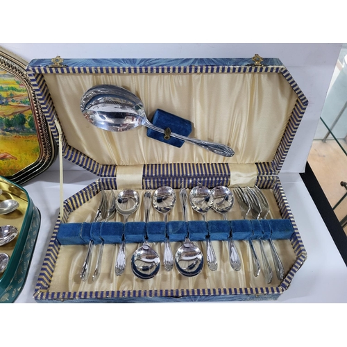 111 - Boxed Cutlery set as well as a tin of various peices of cutlery (Qty)