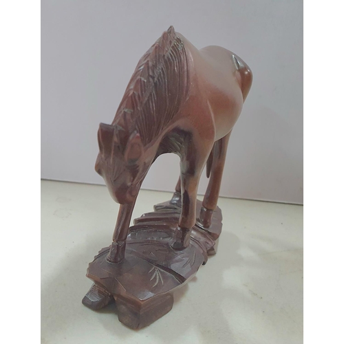 146 - Old Chinese carved horse with marble eyes,

10cm long x 10cm high