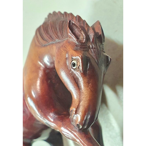 146 - Old Chinese carved horse with marble eyes,

10cm long x 10cm high