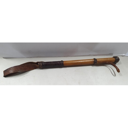 150 - Superb antique wooden and leather handled cosh with original leather grip and leather belt tie