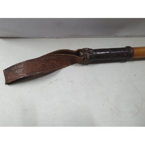 150 - Superb antique wooden and leather handled cosh with original leather grip and leather belt tie