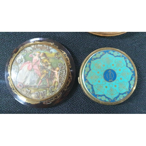 230 - Seven vintage compacts including an inlaid tortoiseshell example (7)