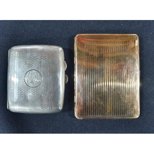 235 - Fine quality Edwardian gilt metal cigarette case together with another silver plate example (2)