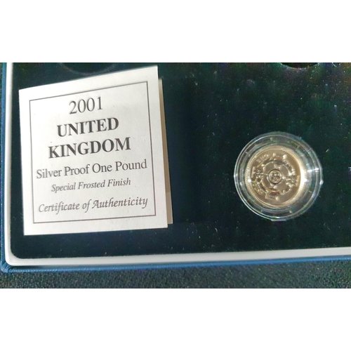 272 - Royal Mint 925 silver proof 2001 £1 coin with special frosted finish, only 2000 produced, with COA,
... 