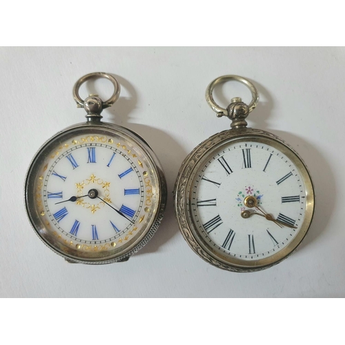 261 - Two 19thC ladies silver pocket watches both with ornately engraved backs and enameled faces (2)