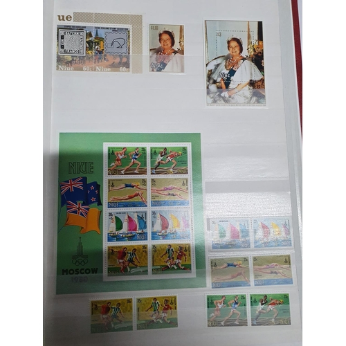 297 - red album of Commonwealth Islands including a good collection of NUIE over-prints to 1982 etc, many ... 