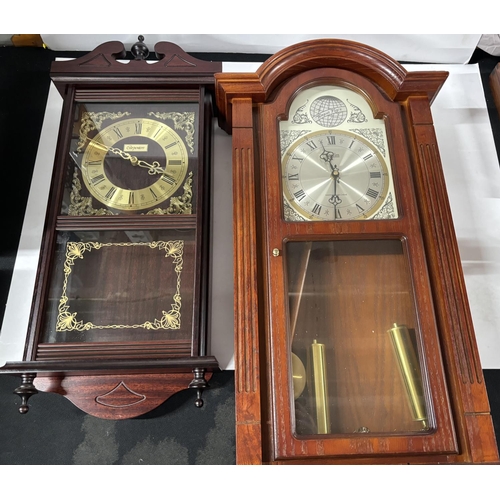 331 - 2 Wall hanging clocks one is tempus Fugit