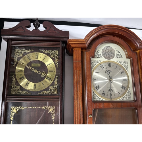 331 - 2 Wall hanging clocks one is tempus Fugit