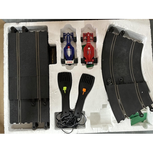 444 - 2 Toy tanks with jeep and other and boxed Scalextric Grand Prix