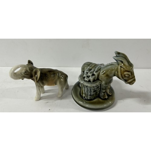 549 - Irish wade donkey with a Royal Dux Elephant