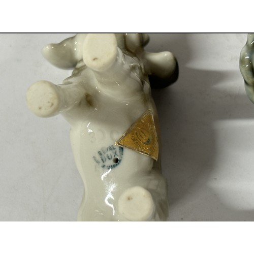 549 - Irish wade donkey with a Royal Dux Elephant