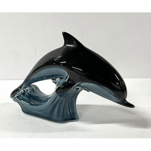 568 - Langham glass paper weight with another and 2 glass dishes along with Poole pottery dolphin