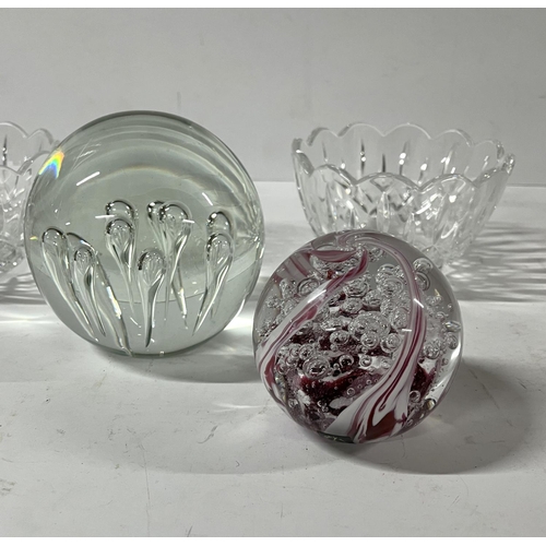 568 - Langham glass paper weight with another and 2 glass dishes along with Poole pottery dolphin