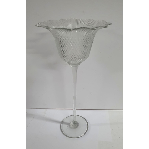 579 - Pair of fine quality free standing, tall glass candle holders by Parlane (2),

Tallest is 40cm tall