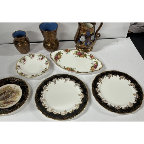 587 - 4 Royal Albert plates including black Diamond and Old Country Roses with 3 luster jugs and a Weather... 