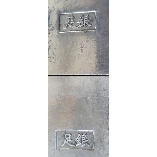 241 - Four Chinese white metal, screen shaped panels, each panel depicting different images, the back side... 