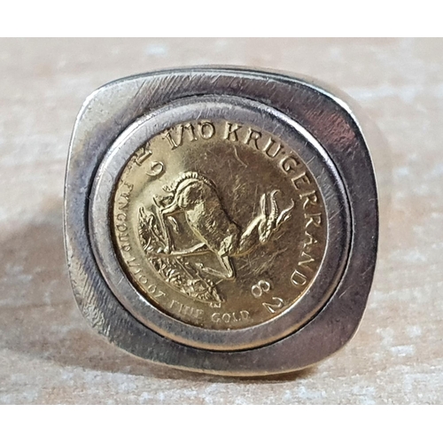 54 - Hallmarked 9ct yellow gold coin ring holding a 1/10th Krugerand,

10.8 grams        size P