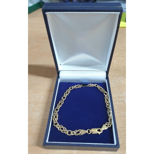 60 - Hallmarked 375 yellow gold ladies fancy link bracelet in presentation blue box,

5 grams