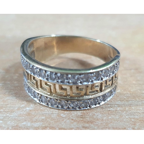 69 - Unusual 9ct yellow gold dress ring with Greek key decoration in presentation box,

4.3 grams gross