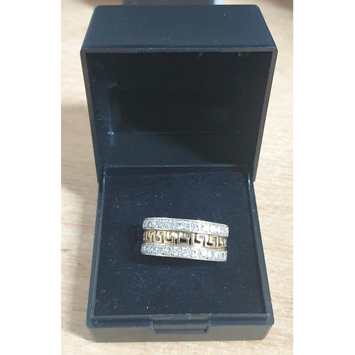 69 - Unusual 9ct yellow gold dress ring with Greek key decoration in presentation box,

4.3 grams gross