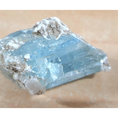 184 - Raw uncut block of natural Pakistan Aquamarine crystal,

50 x 35 x 30 mm     weight 69 grams gross.
... 