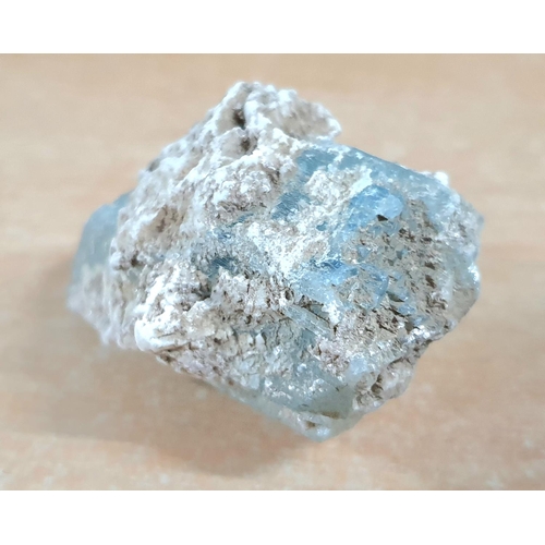 184 - Raw uncut block of natural Pakistan Aquamarine crystal,

50 x 35 x 30 mm     weight 69 grams gross.
... 