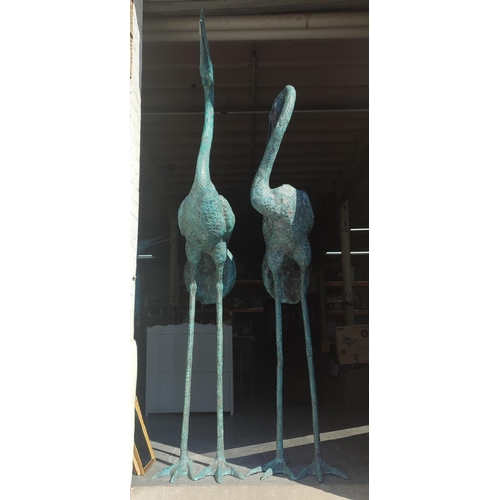 375 - Pair of huge bronze Herons, largest one is approx. 8ft. tall and the other approx. 7.5ft. tall (2)