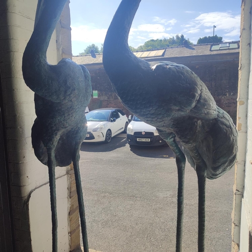 375 - Pair of huge bronze Herons, largest one is approx. 8ft. tall and the other approx. 7.5ft. tall (2)