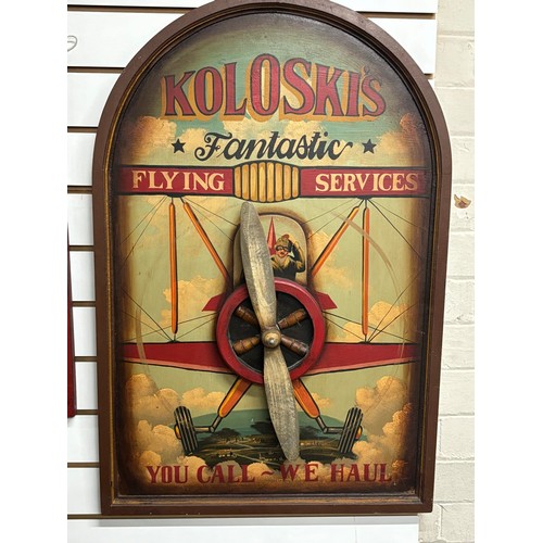 174 - 2 Hand painted advertising signs 1 is J.Peacock golf equipment and Koloskis fantastic flying service... 