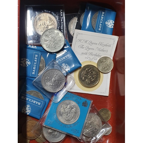 514 - Metal cash tin with key containing mainly British commemorative coins including a £5 example, 2 boxe... 