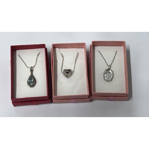 27 - 925 silver heart sister pendant on chain along with silver teardrop pendant and another pendant cont... 