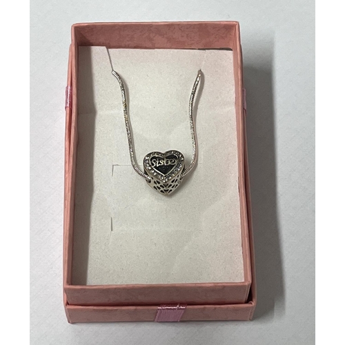 27 - 925 silver heart sister pendant on chain along with silver teardrop pendant and another pendant cont... 