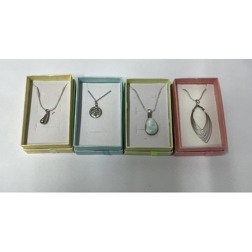 31 - 925 silver teardrop pendant along with wire leaf shape pendant, silver/blue white stone pendant and ... 