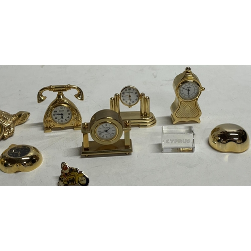 272 - Collection of miniature clocks mainly brass