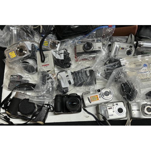 350 - Large Qty of cameras including chargers and batteries, Kodak Brownie 127 and Olympus Trip 35 with ma... 