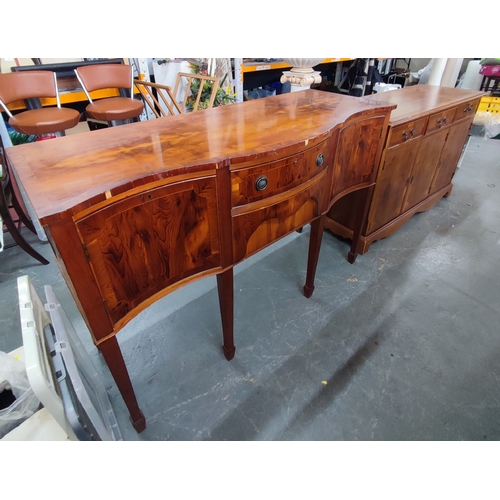 443 - A mid-century buffet together with a similar sideboard together with a short-legged bureau with drop... 