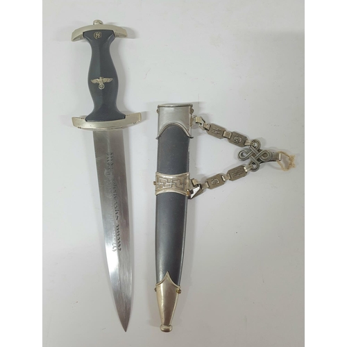 38 - SS Dagger with scabbard and type II chain. The roundel is silvered, the crossguards appear to be ste... 