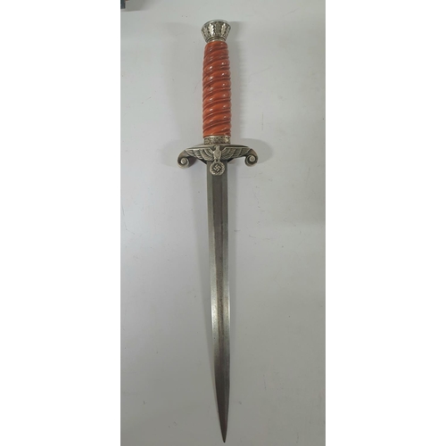 51 - German Army Officers parade dagger. The dagger having a steel oak leaf pommel, twisted celluloid gri... 