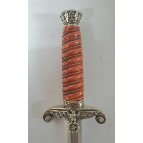 51 - German Army Officers parade dagger. The dagger having a steel oak leaf pommel, twisted celluloid gri... 