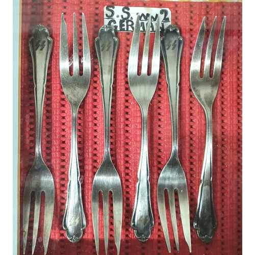 1 - Set of six (possibly silver) framed and encased cake forks, each one 