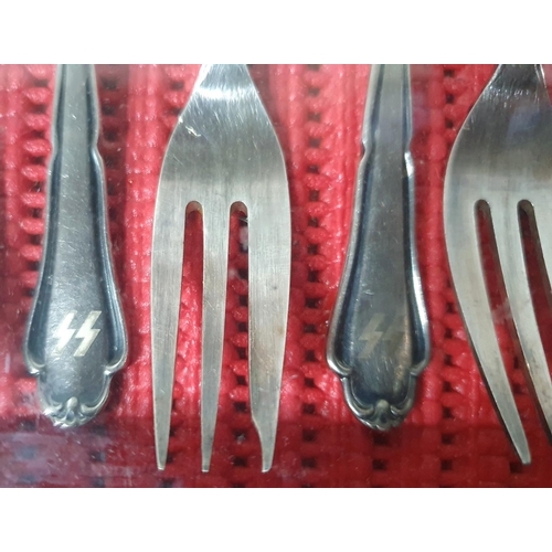 1 - Set of six (possibly silver) framed and encased cake forks, each one 