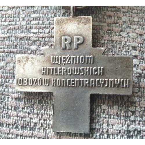 3 - Replica -The Auschwitz Cross (Polish: Krzyż Oświęcimski), instituted on 14 March 1985, was a Polish ... 