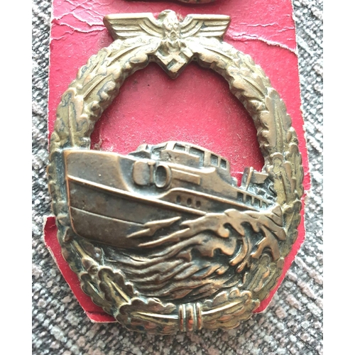 20 - Rare WWII German Kriegsmarine, Auxiliary Cruiser cap badge with makers mark R.R.S. stamped verso (to... 