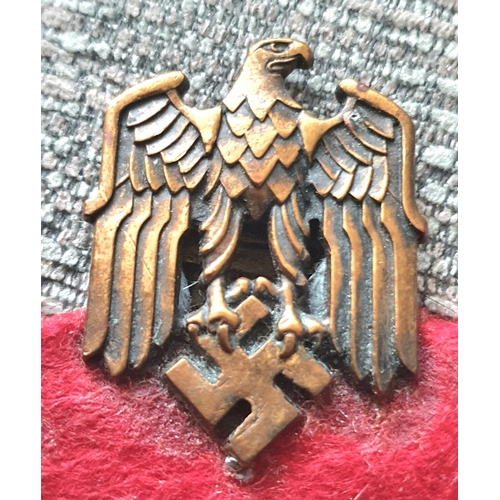 21 - Three WWII German cap badges to include a rare Kriegsmarine U-boat clasp in bronze 1st pattern by Sc... 