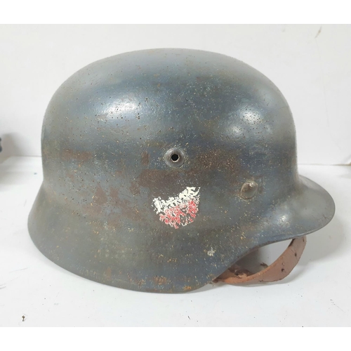 26 - Luftwaffe 1938 blue painted, double decal helmet complete with original 8 flap inner and original le... 