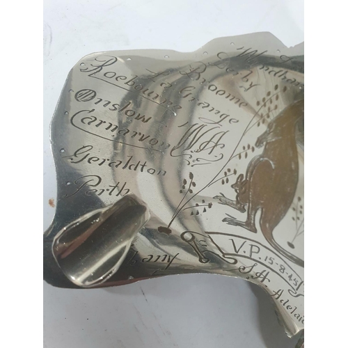 18 - Unusual WWII era silvered metal pen rest depicting aLockheed twin engined plane with the etched incr... 